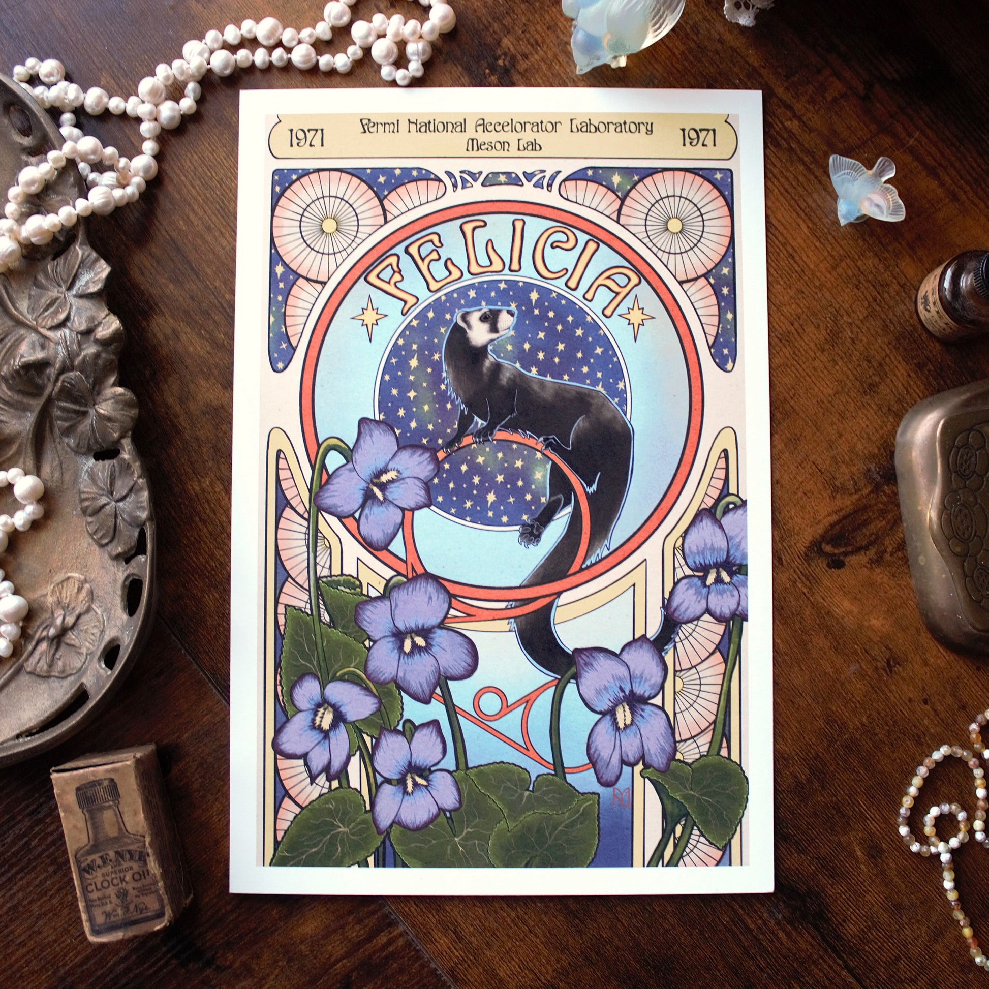 An illustration of Felicia the ferret and flowers on a wooden surface with jewelry and a phone.
